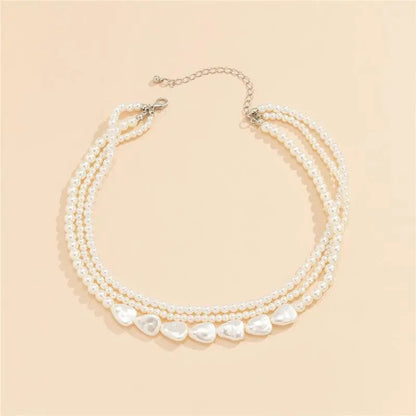 White Stone and Pearl Necklace in Gold